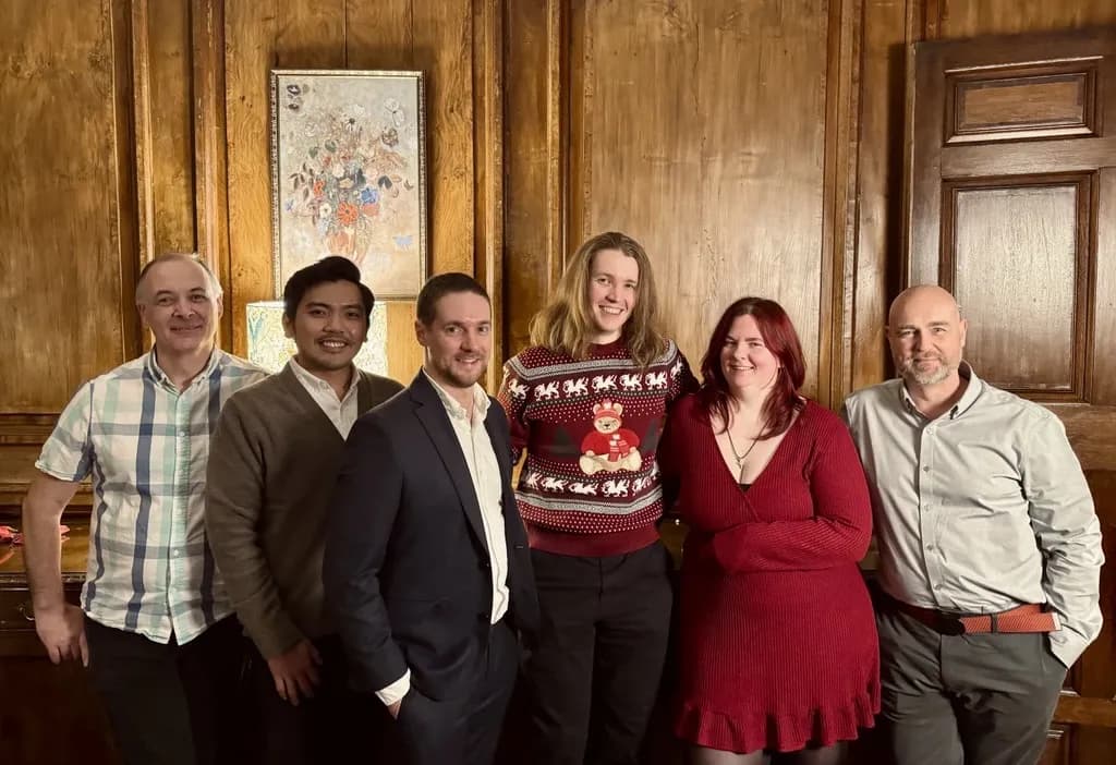 Stratas team together